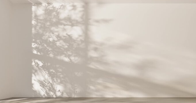 Soft sunlight and tree branch shadows on beige wall in empty room with wooden floor, minimal aesthetic background with natural light for product display, mockup and presentation design