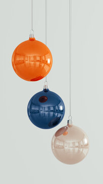 Three Colorful Christmas Baubles in Vertical Composition