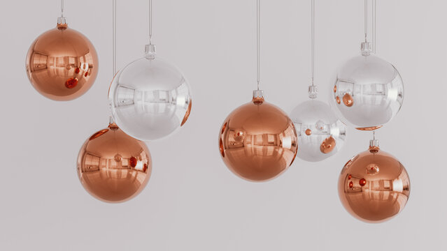 Copper and Silver Christmas Baubles on Neutral Background