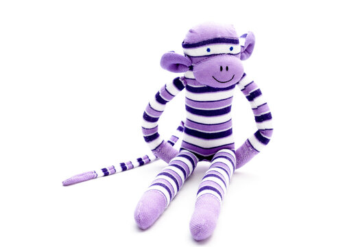 Monkey sock toy isolated on white background