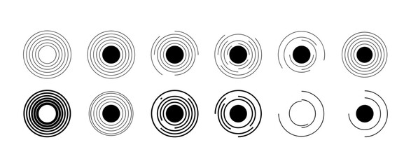 Fototapeta premium Abstract circular patterns with varying line thickness and solid centers in a clean presentation