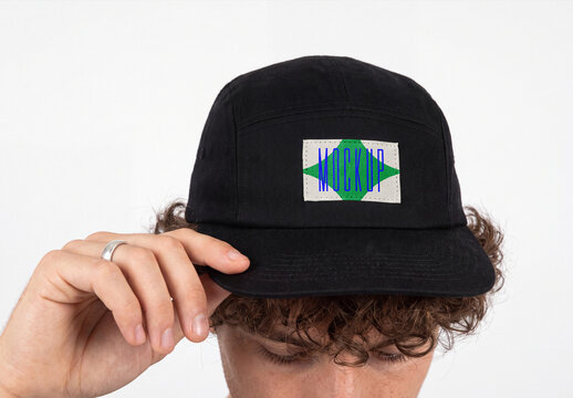 Five Panel Cap Mockup Worn by Man with Woven Patch Logo