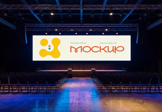 Conference Stage Screen Mockup in Empty Event Hall with Colorful Lighting