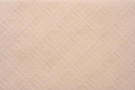 Beige paper texture with subtle diagonal geometric pattern