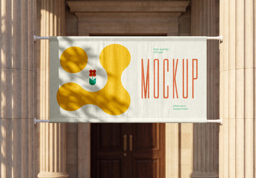 Fabric Banner Mockup Hanging Between Columns at Building Entrance