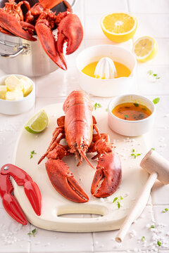 Teasty and fresh lobster with hammer and splitting tongs.
