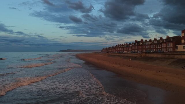 Aerial view of Redcar beach and houses at sunset