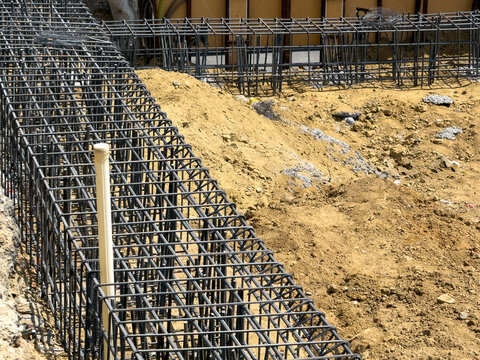 View of steel rebar cages for a building foundation at a construction site in Sariyer, Istanbul, Turkiye.