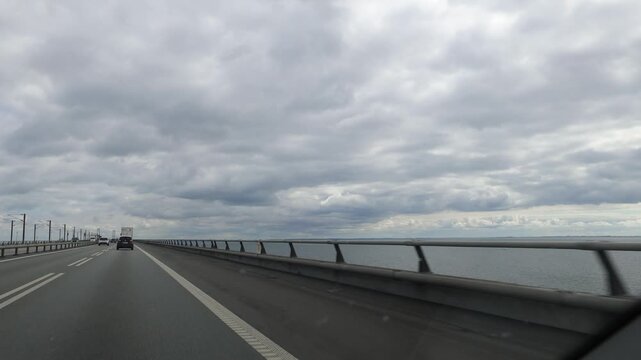 Nyborg, Denmark A view of driving over the Big Belt bridge, an 18-kilometer road and rail link hat connects the islands of Zealand and Funen. Opened in 1998.