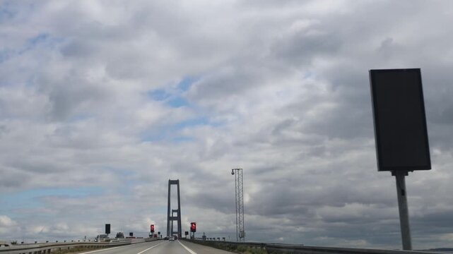 Nyborg, Denmark A view of driving over the Big Belt bridge, an 18-kilometer road and rail link hat connects the islands of Zealand and Funen. Opened in 1998.