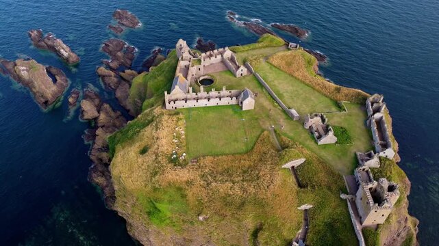 Aerial Drone View of Dunnottar Castle on the Scottish Coast, Slow Cinematic Approach
