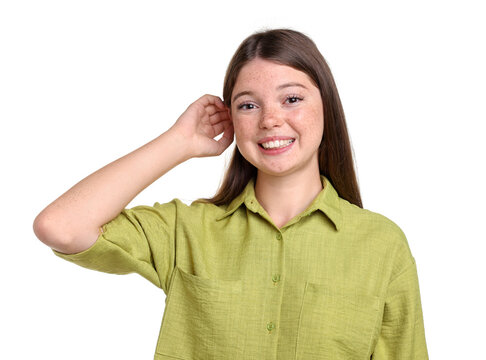 Beautiful girl with freckles on white background