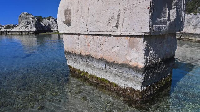 Ancient Lycian sarcophagus in the sea at Kekova, Turkey