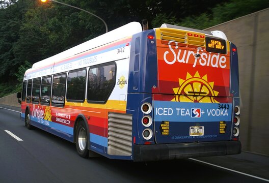 Pennsylvania, U.S.A - Aug 15, 2026 - A colorful SEPTA bus advertisement promoting Surfside Iced Tea and Vodka with bright graphics and branding.