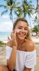 Fototapeta premium Woman applying sunscreen on face at beach