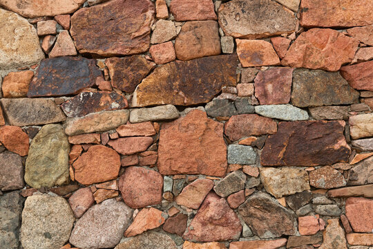 natural red stone wall texture background