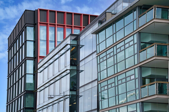 Row of modern glass fronted buildings