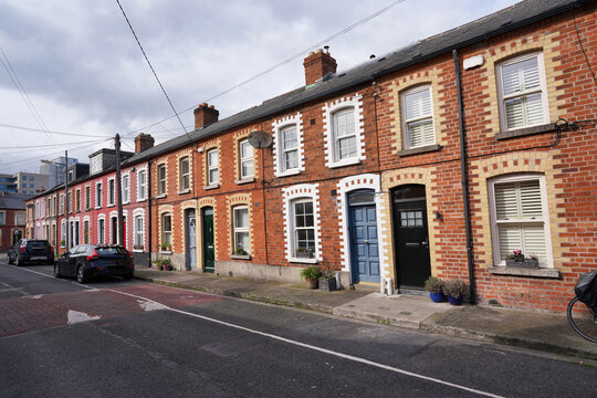 Modest brick row houses in central Dublin near the new high tech "Silicon Docks" office buildings were formerly working class homes