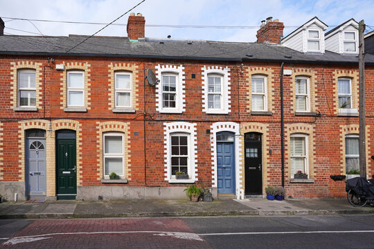 Modest brick row houses in central Dublin near the new high tech "Silicon Docks" office buildings were formerly working class homes