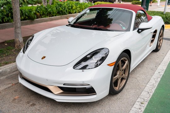 Miami, Florida, USA - May 05, 2025: 2022 Porsche 718 Boxster special 25th anniversary edition convertible car. Luxury Porsche 718 Boxster. Car Porsche Boxster parked outdoor. White car, side view
