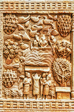 Narrative Buddhist relief depicting a river crossing or sacred water journey scene with birds, lotus vegetation, devotees, and nature motifs, carved on the Torana of the Great Stupa at Sanchi, Sanchi