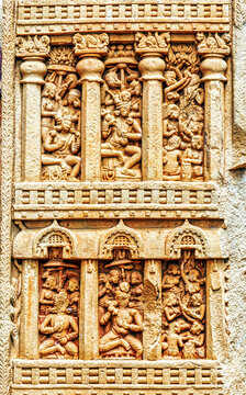 Multi-tiered narrative relief panel depicting palace balconies, courtly life, musicians, dancers, and social gatherings from early Buddhist art on the Sanchi Torana, Sanchi Stupa, India