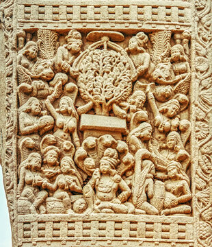Aniconic Buddhist relief depicting the veneration of the sacred Bodhi Tree by devotees, nāga figures, and celestial beings, symbolizing the Enlightenment of the Buddha, from the Great Stupa, Sanchi