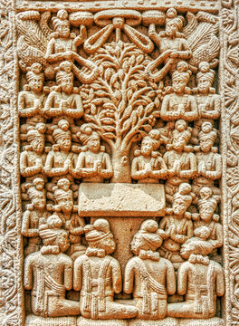 Aniconic Buddhist relief depicting the veneration of the sacred Bodhi Tree by devotees, celestial beings, serpent guardians, symbolizing the Enlightenment of the Buddha, from the Great Stupa, Sanchi