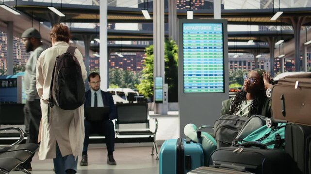 Close-up of woman next to trolleys gathered in bus terminal