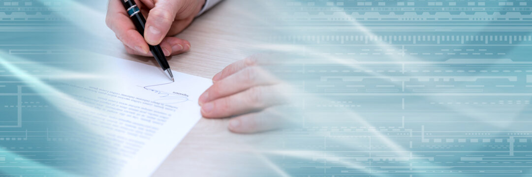 Man signing a contract; panoramic banner