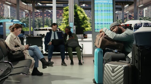 Close-up of weary traveler dozing on trolley in bus terminal
