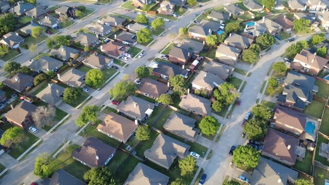 Intersecting street patterns weave through Lakewood Estates near Willowlake Drive. Gabled composite rooflines, lush turf, parked passenger sedans illustrate community living, Little Elm, Texas