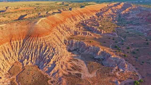 Aerial view of clay spires, pinnacles and fluted columns glowing at sunrise in Cathedral Gorge State Park, Nevada