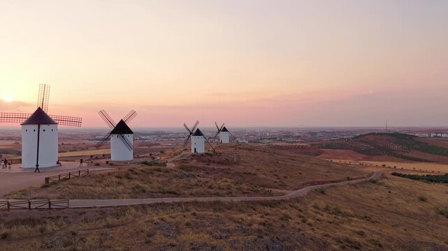 Traditional spanish don quixote windmills at sunset aerial view