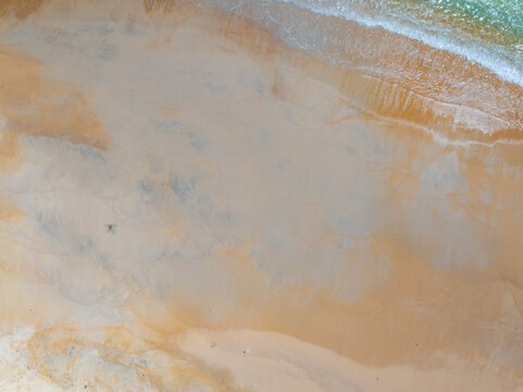 Bird eye view photo of sea beach water surface texture background