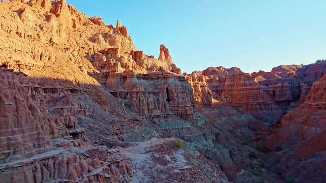 Scenic clay pinnacle formations illuminated by golden sunlight along Miller Point Trail in Cathedral Gorge State Park Nevada