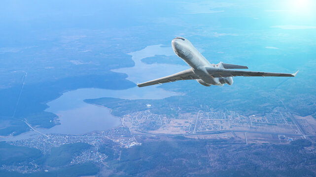 Commercial Airplane Flying Over City and Lakes Aerial View &mdash; 3D Render