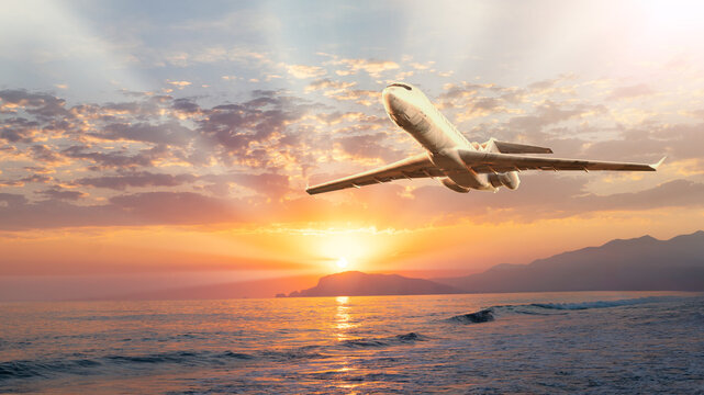 Commercial Airplane Flying Over Ocean at Golden Sunset with Mountain Silhouette &mdash; 3D Render