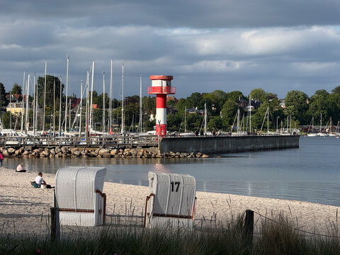 Lighthouse and hooded beach chairs in Eckernf&ouml;rde Germany