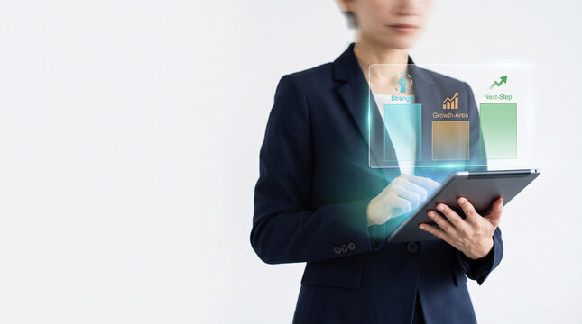 Businesswoman using digital tablet to analyze microlearning analytics data with holographic charts representing modern corporate training progress and employee performance metric reports.
