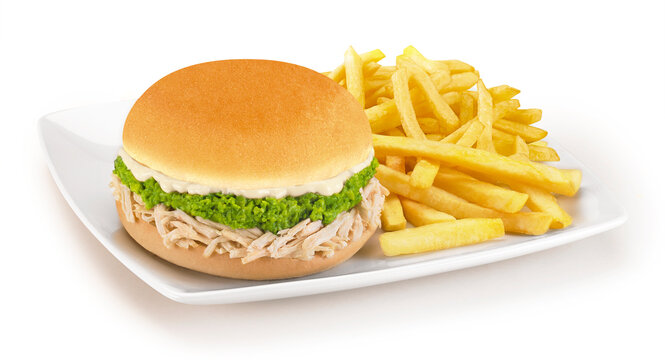 Chilean ave palta mayo chicken sandwich with mashed avocado and french fries isolated on white background.