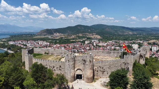 Aerial drone view of Samuel Fortress a historic castle at the top of the old town in Ohrid, North Macedonia. featuring historic old town, UNESCO heritage landmarks and crystal clear Lake Ohrid