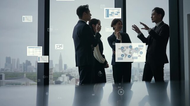 会話する人々とビジネスデータ。経営、企業、DX、デジタル、情報、分析、会議、経済、金融、経理、決算