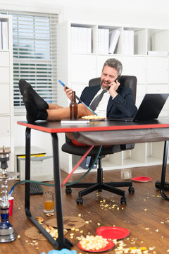 Funny freelancer. Crazy businessman in jacket and shorts on funny business meeting. Crazy funny business man freelancer on business meeting in mess. Funny workday. Free business.