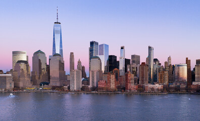 Fototapeta premium New York skyline. NYC skyline with Hudson landscape. Manhattan at night. New York City panoramic skyline. NYC aerial cityscape. New York City downtown at night. New York panoramic cityscape.