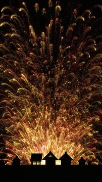 Golden Fireworks Bursting Behind a House Silhouette Generative AI