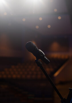 microphone on stage with spotlight