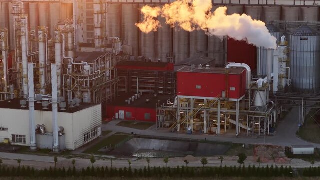 Aerial view of methanol and ethanol factory plant in corn field. Bioagra Goswinowice Ethanol Production Plant located near Nysa in Poland. Factory of bioethanol and ethanol produced from corn grain