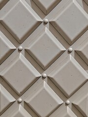 Naklejka premium Cream geometric diamond pattern with embossed 3D panel texture, architectural background