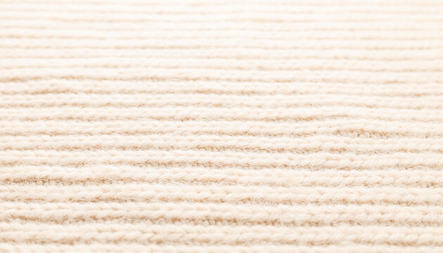 Cozy light beige knitted sweater texture background